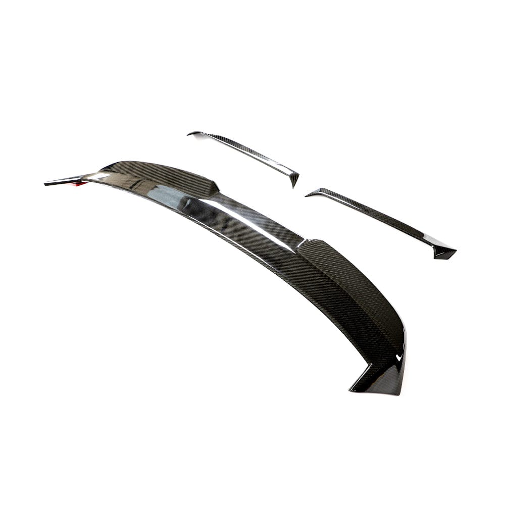 BMW M3 G81 G21 carbon fiber spoiler by CT Design, showcasing the aerodynamic rear spoiler with sleek carbon fiber finish.