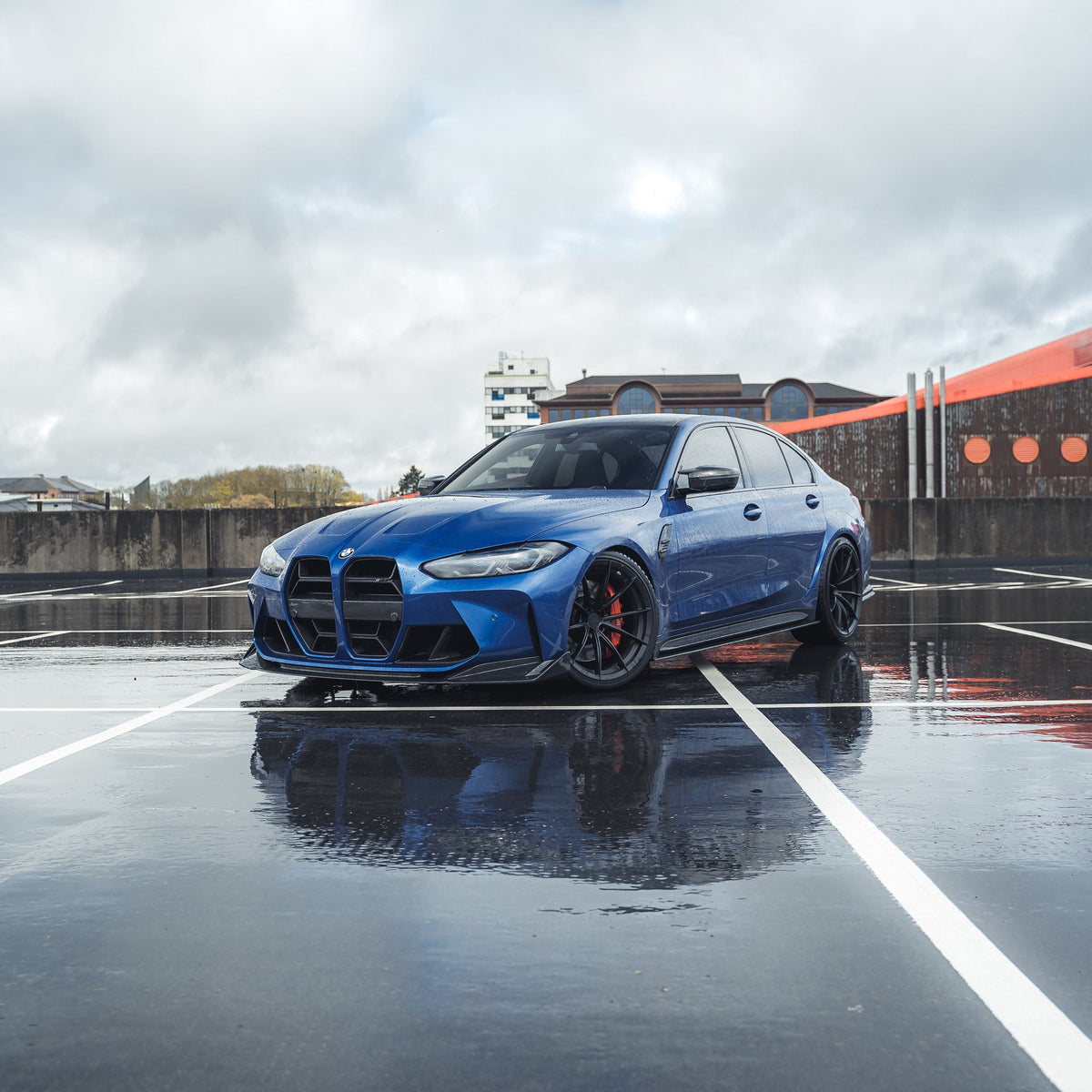 BMW M3 and M4 G80 G81 G82 G83 carbon fibre splitter by CT Carbon, showing the sleek, lightweight design and textured finish.