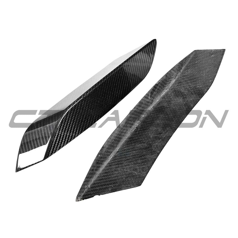 BMW M3/M4 F80 F82 F83 carbon fiber front canards, automotive accessories by CT Carbon, shown on a sporty BMW front view.