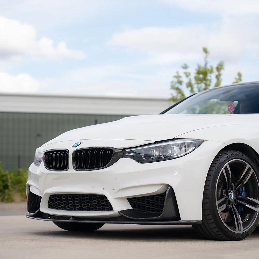 BMW M3 M4 F80 F82 F83 carbon fiber splitter set, featuring four front grille pieces, designed for 2014-2020 models by CT Carbon.