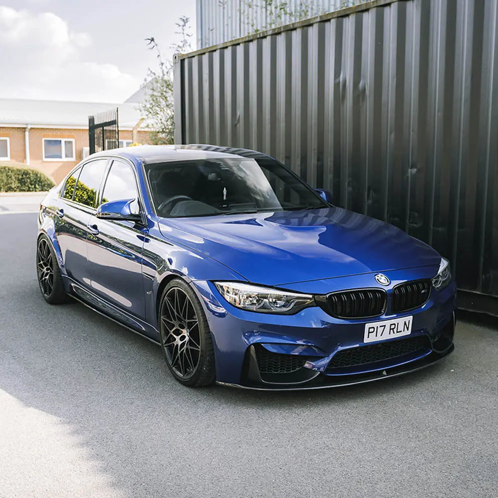 BMW M3 M4 F80 F82 F83 carbon fiber side skirts by CT Carbon, featuring a sleek MP style design for enhanced aerodynamics.