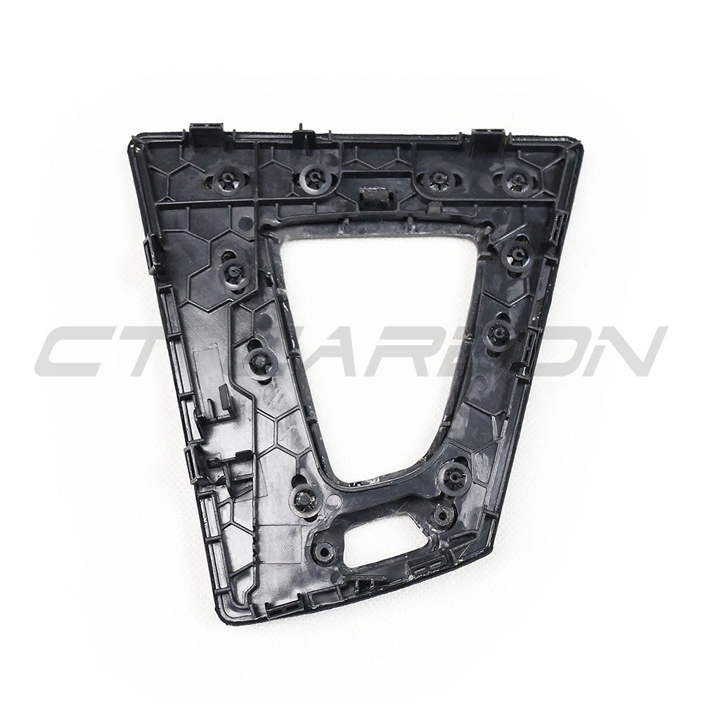 BMW M3 M4 F80 F82 F83 F87 ALCANTARA and carbon shifter surround accessory by CT Carbon, LHD vehicle, close-up view.