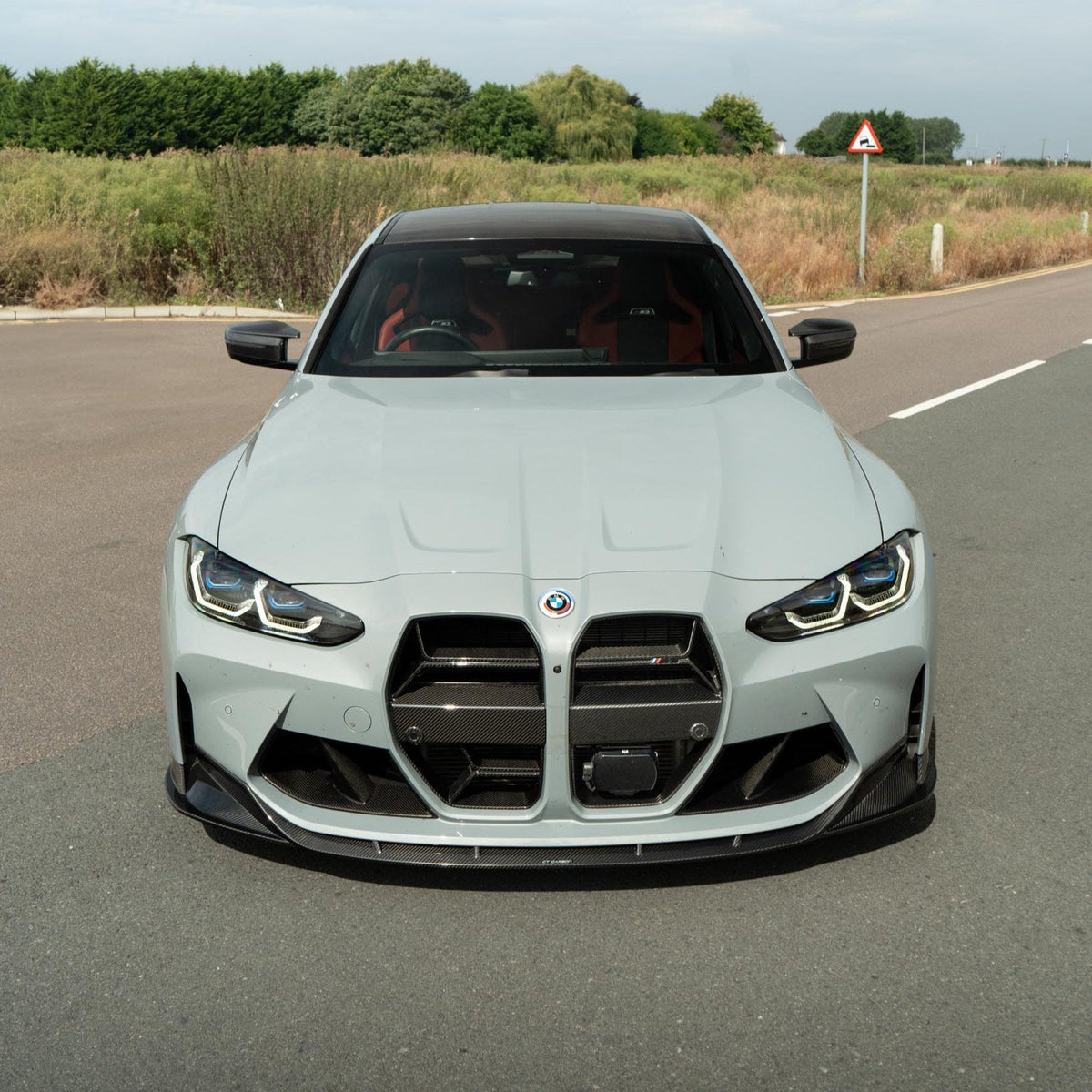BMW M3 M4 G80 G82 carbon fibre grille with ACC, designed by CT Carbon, showcasing the sleek textured finish and precise fit.