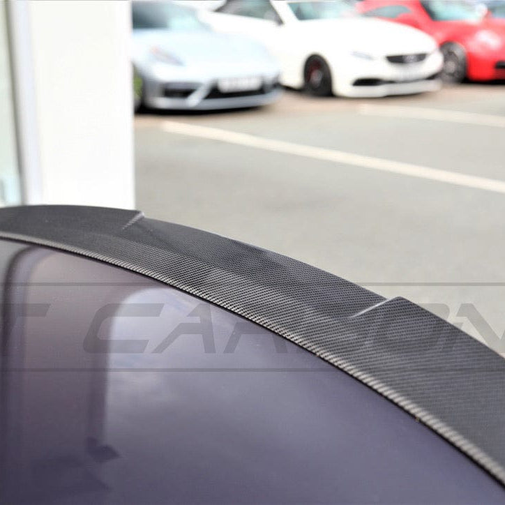 BMW M4 F83 F33 4 Series carbon fiber spoiler by CT Carbon, showcasing sleek V1 style design on the car's trunk.