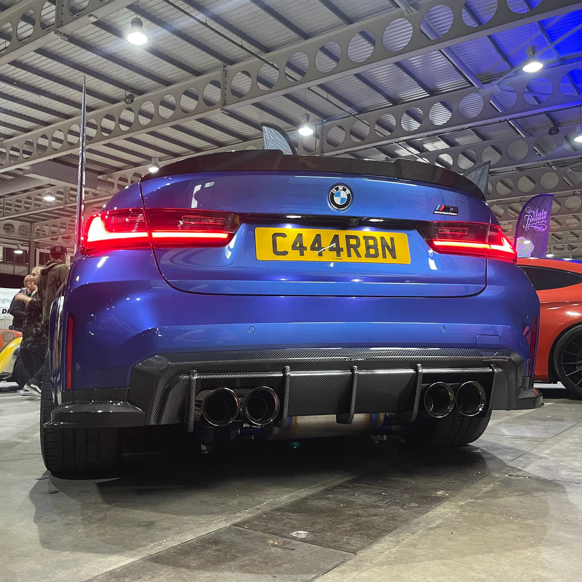 BMW M4 G82 G83 carbon fibre diffuser by CT Design, showcasing sleek, lightweight aerodynamic car rear diffuser with textured finish.