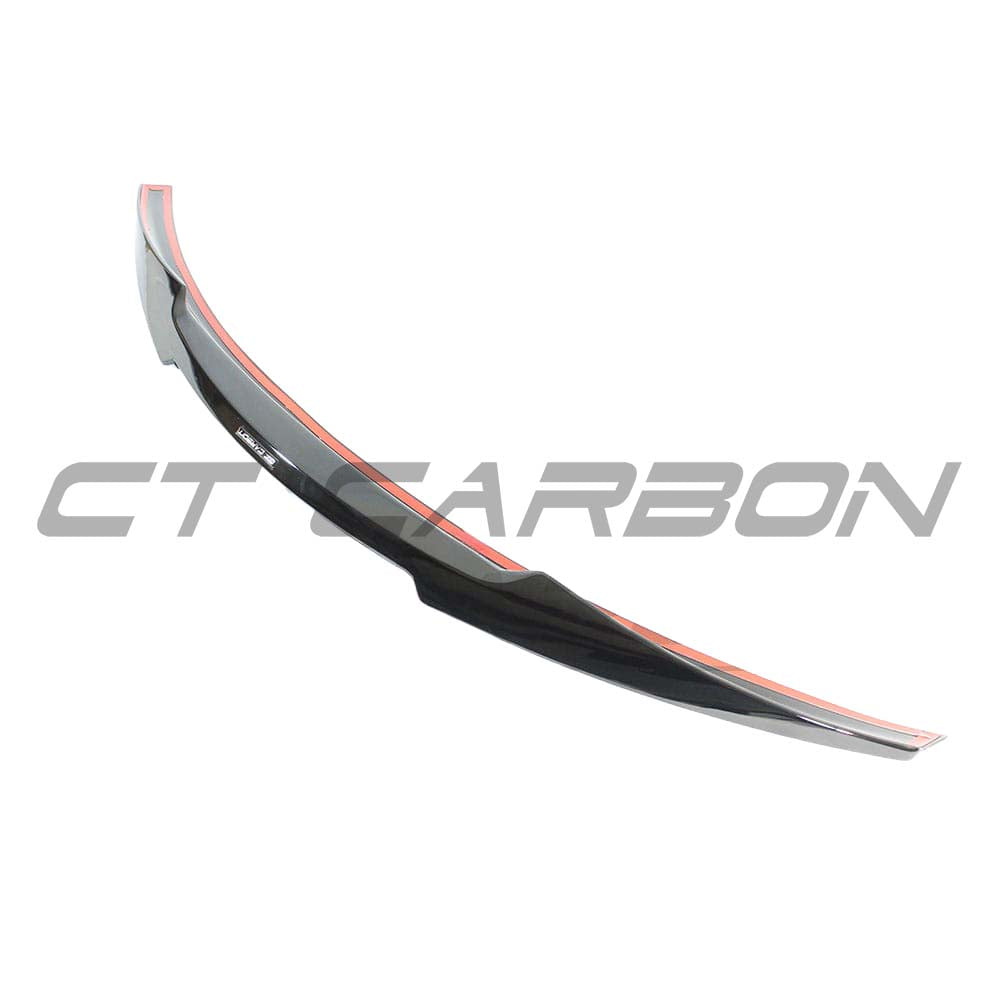 Full gloss black BMW M4 F83 convertible kit by CT Carbon, including spoiler and exterior body components.