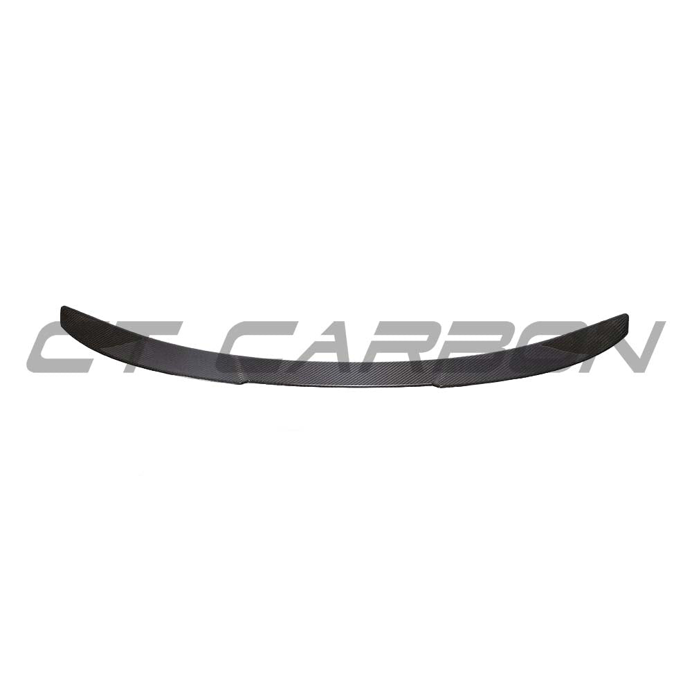 BMW G22 4 Series carbon fibre kit by CT Carbon, featuring a sporty carbon fibre spoiler for enhanced aerodynamics.