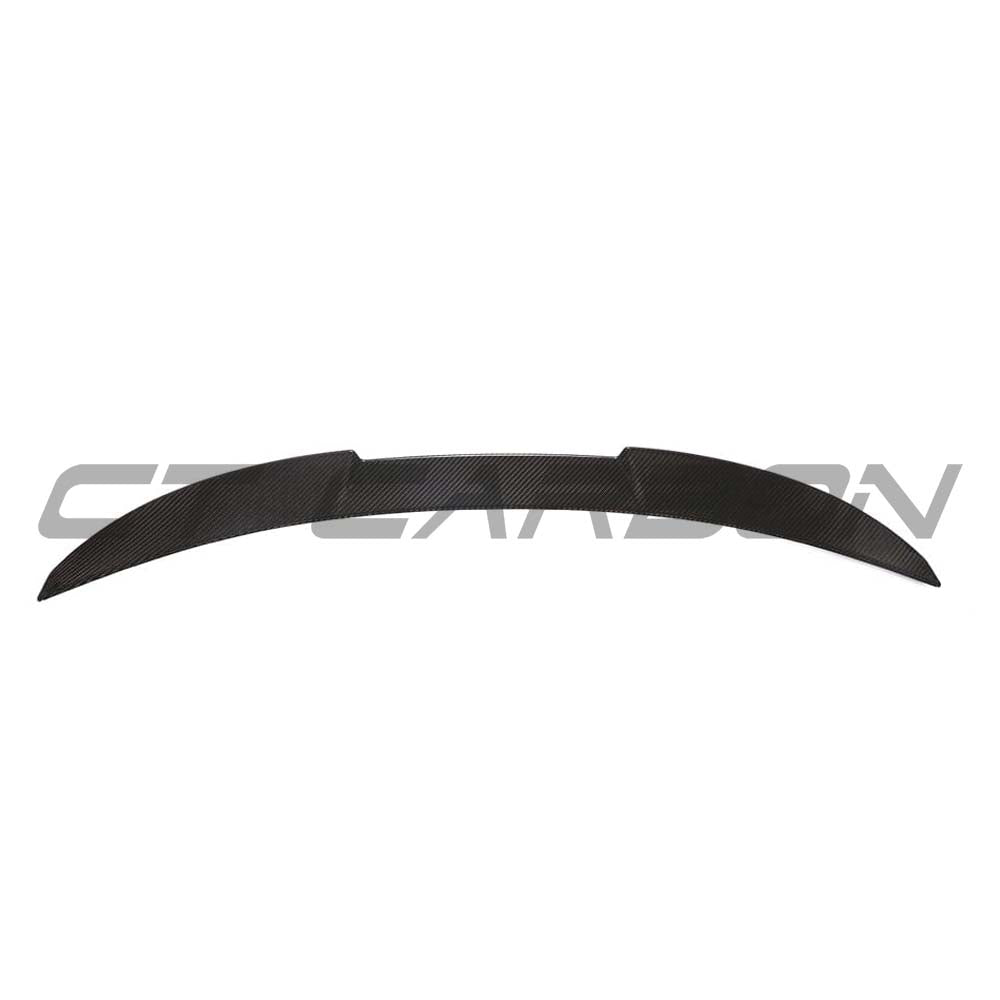BMW G82 M4 full carbon fibre kit by CT Design, including spoiler and body parts, showcasing sleek carbon fiber finish.
