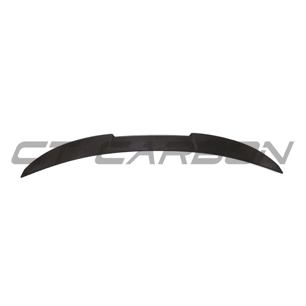 BMW G22 4 Series Carbon Fibre Kit by CT Carbon, including spoiler and body accents, showcasing a sleek carbon fibre finish.