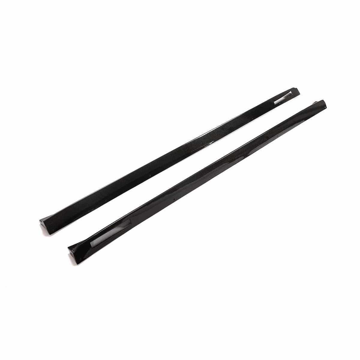 BMW X3M/X4M F97/F98 carbon fibre side skirts in 3D style by CT Carbon, showing sleek, aerodynamic design on the vehicle.