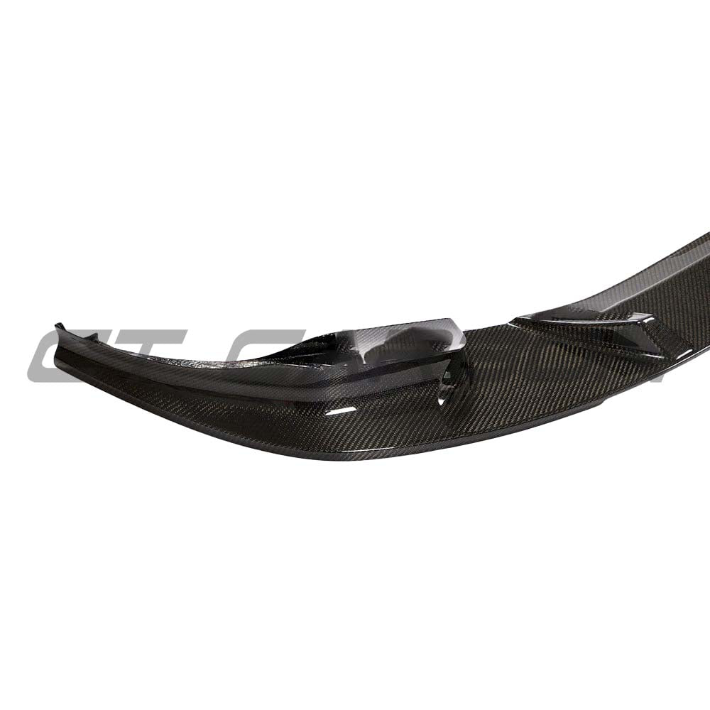 BMW X3M/X4M F97/F98 2018-2021 CT Carbon carbon fiber splitter, front view showcasing 3D style design on vehicle.