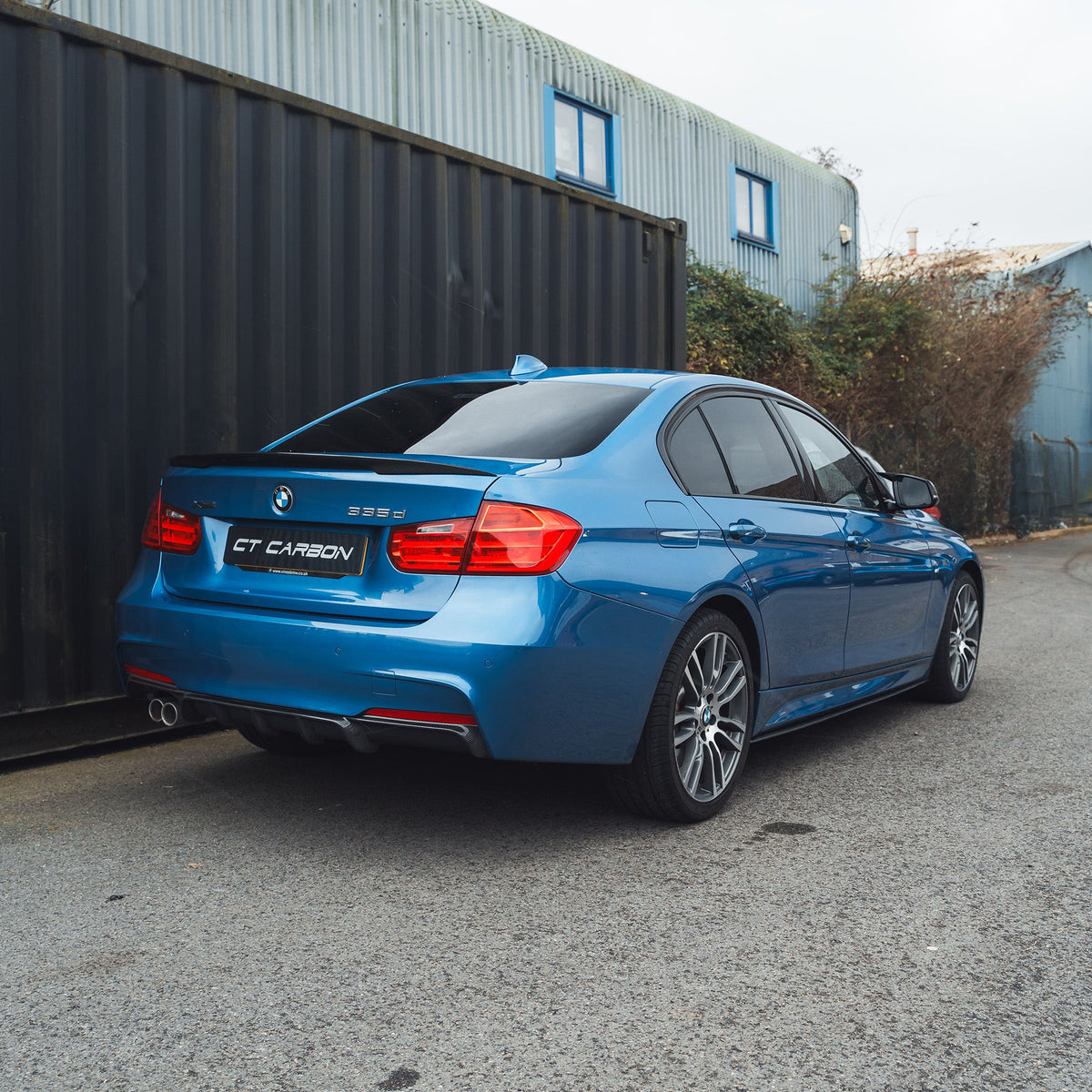 BMW F30 3 Series saloon full carbon fiber kit by CT Carbon, showcasing the sleek carbon fiber panels on the car.