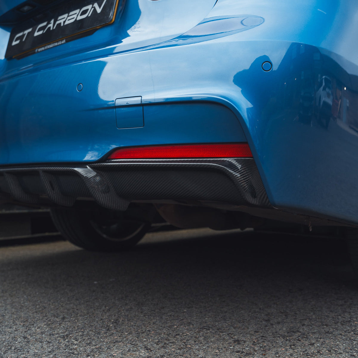 BMW F30 3 Series saloon full carbon fiber kit by CT Carbon, showing detailed exterior components on a sleek car.