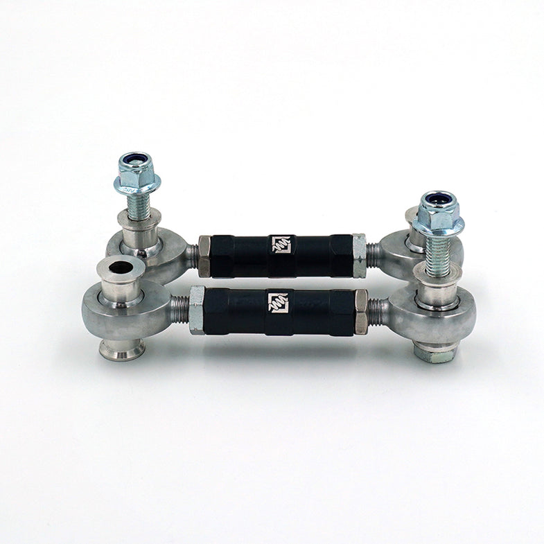 Suspension Secrets adjustable rear drop links for BMW G87 M2, showing close-up of suspension linkage components and mounting points.