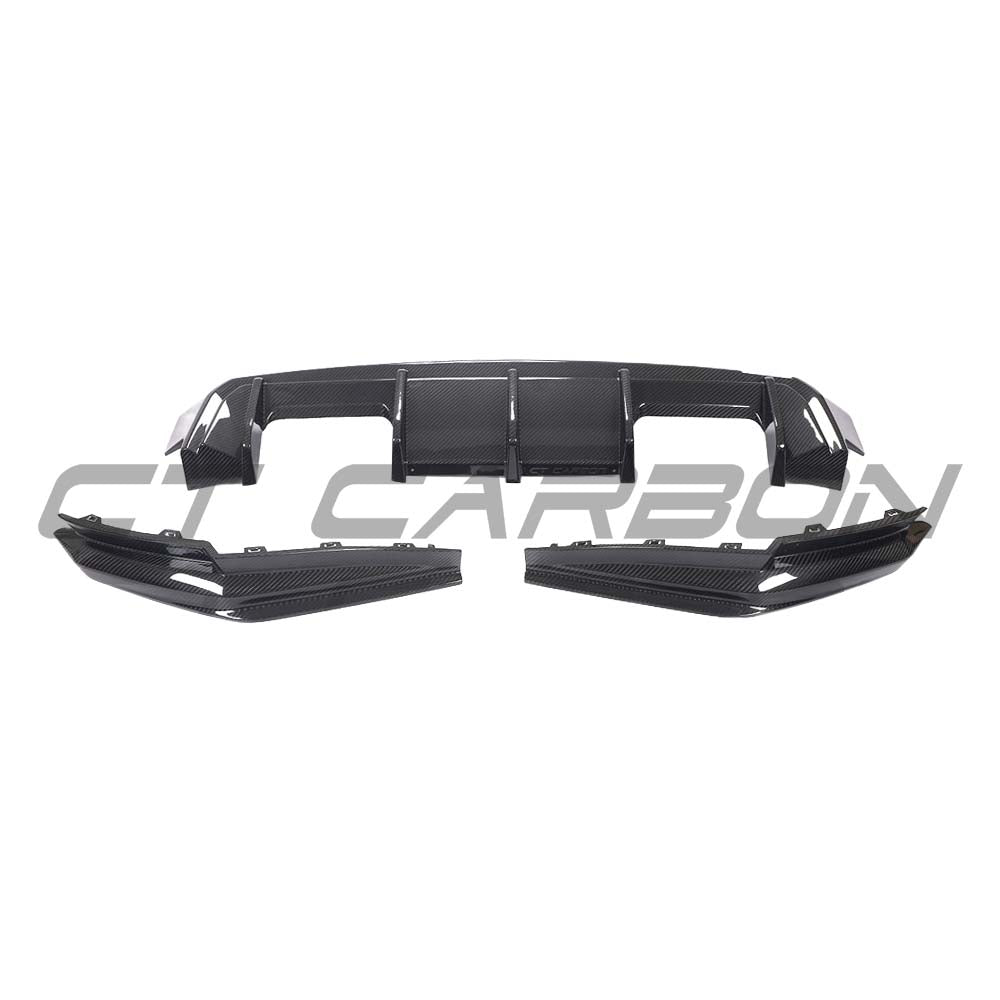 BMW G80 M3 full carbon fibre kit by CT Carbon, featuring a diffuser and aerodynamic components, on a sleek sports car.