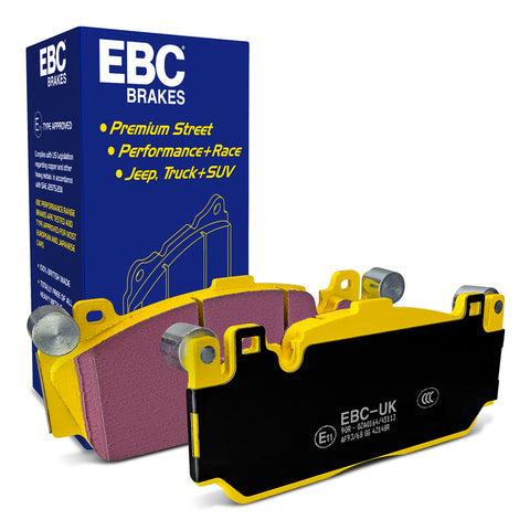 Pair of EBC Yellowstuff front brake pads for BMW M2 F87, M5 F10, M6 F12, F13 callipers, shown in a large box.