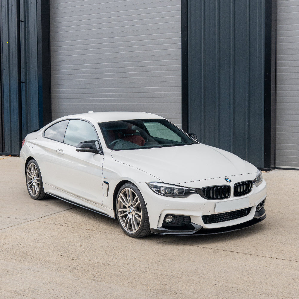 BMW M4 F82/F83 and 4 Series F32/F33/F36 double slat black grille by CT Carbon, front view showing sleek grille design.