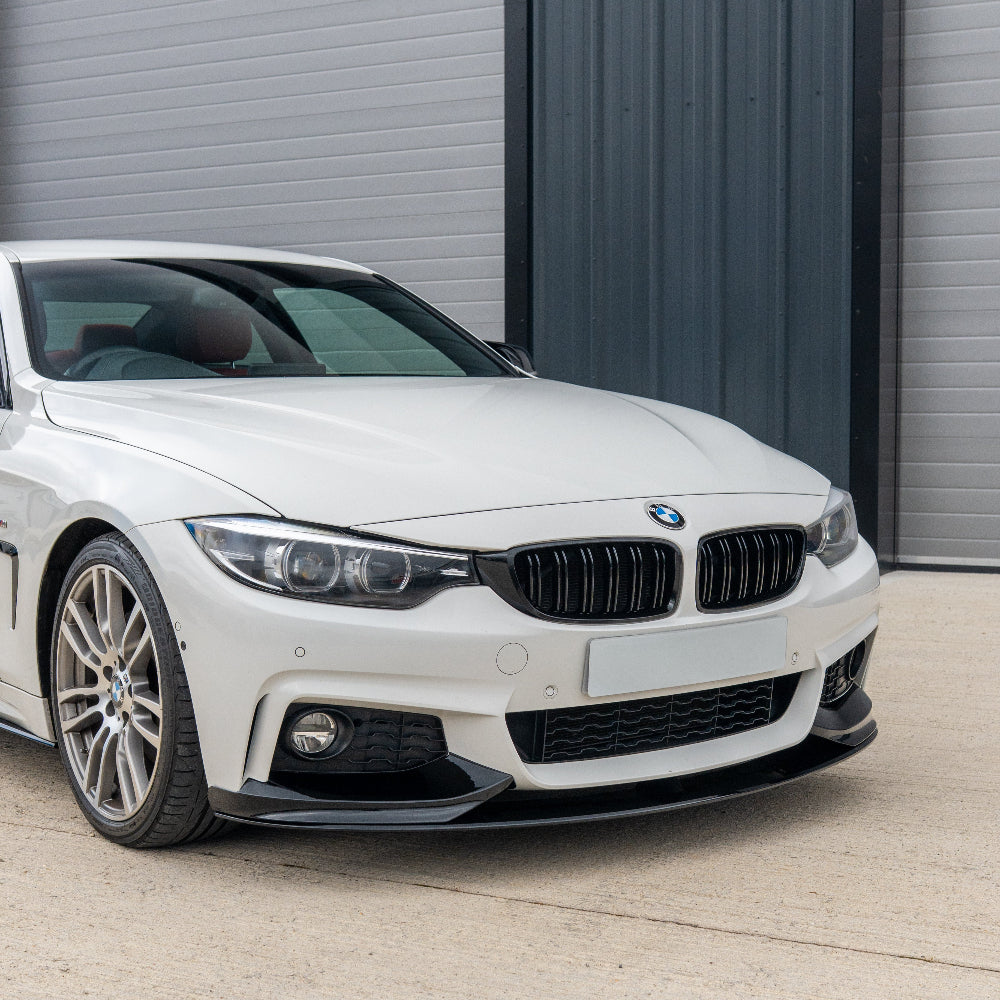BMW M4 F82/F83 and 4 Series F32/F33/F36 black double slat grille by CT Carbon, showcasing the sleek automotive grille design.