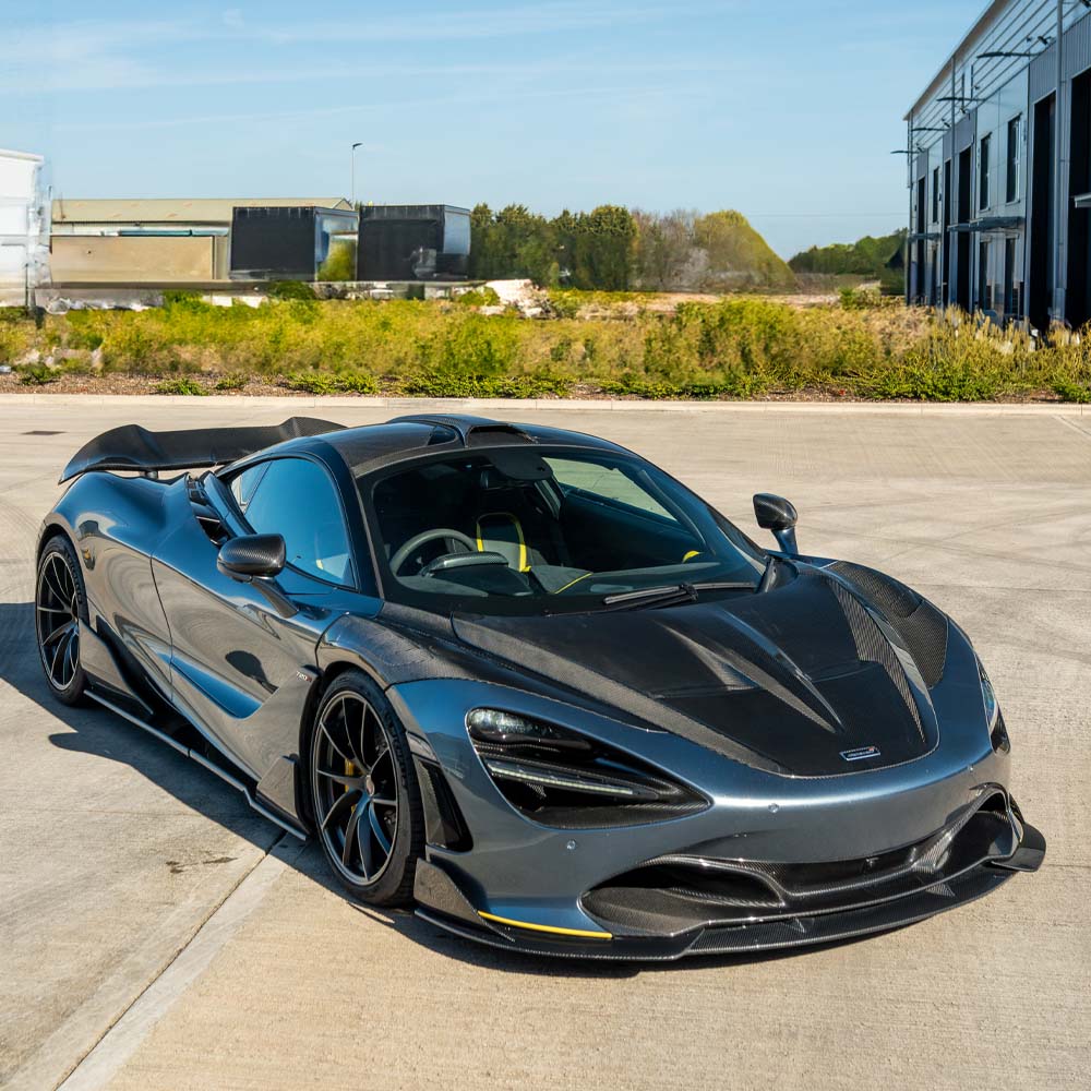 Close-up of the CT Carbon McLaren 720S Ultimate Kit installed on the car, highlighting carbon fiber details and sleek design elements.