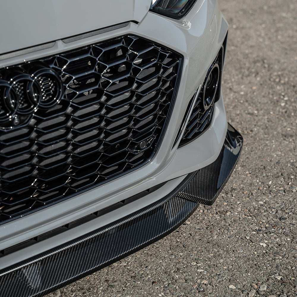 Carbon fibre splitter for Audi RS5 B9.5 Sportback and Coupe 2020-2025 by CT Carbon, shown on a sleek vehicle.