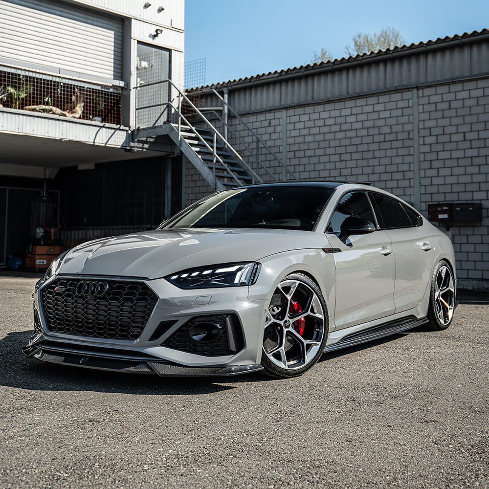 CT Carbon splitter for Audi RS5 B9.5 Sportback and Coupe 2020-2025, made of carbon fiber, shown installed on the front bumper.