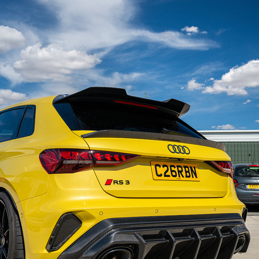 Carbon fiber middle spoiler for Audi A3/S3/RS3 8Y Sportback, installed on the rear of the vehicle for enhanced sporty appearance.