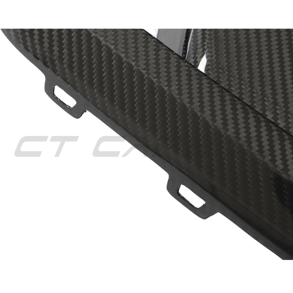 BMW X3M/X4M F97/F98 LCI 2022+ carbon fibre front bumper trim by CT Carbon, featuring sleek, lightweight accessory details.