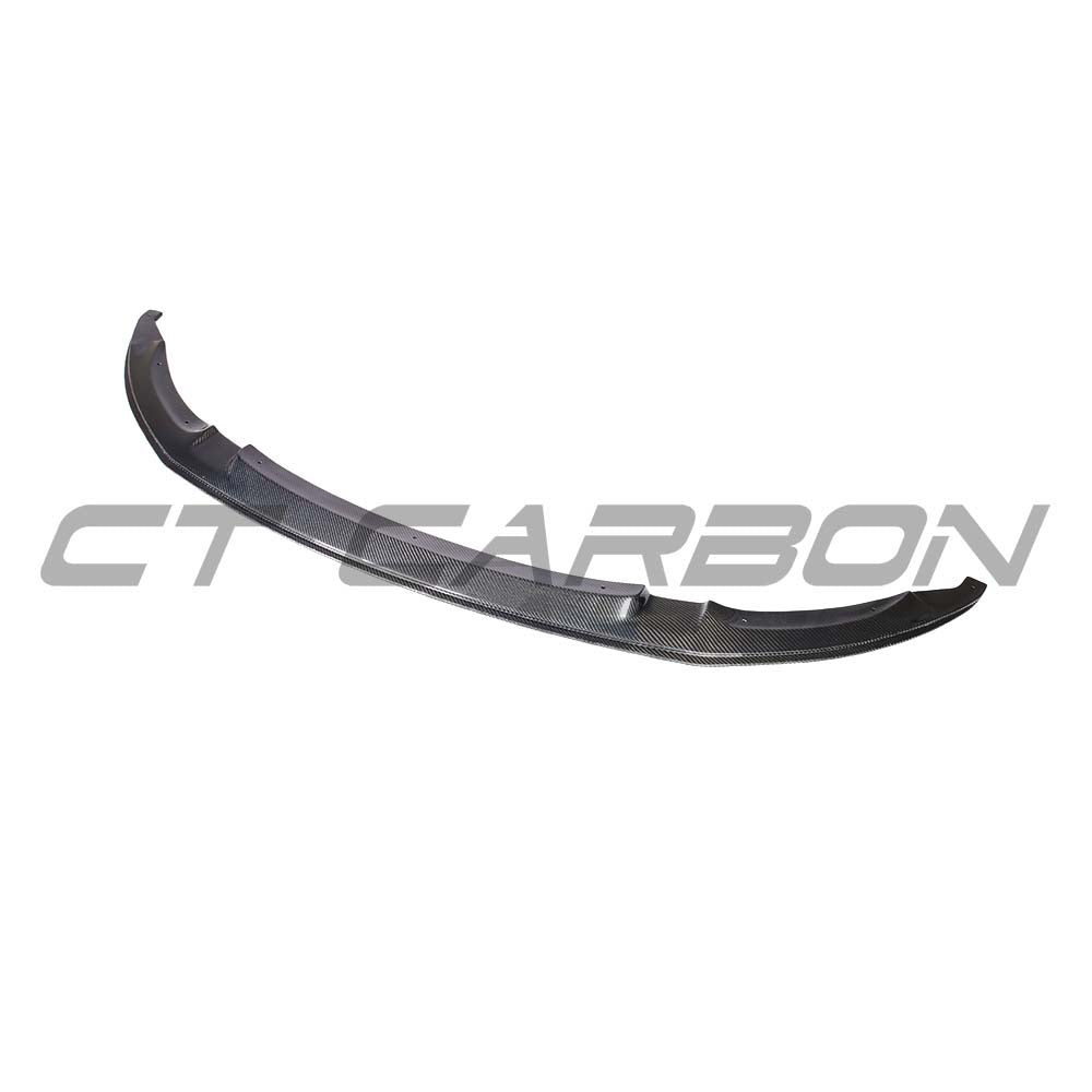 BMW M3 M4 carbon fibre splitter by CT Carbon, V7 model, showcasing sleek, lightweight aerodynamic design on a sports car.