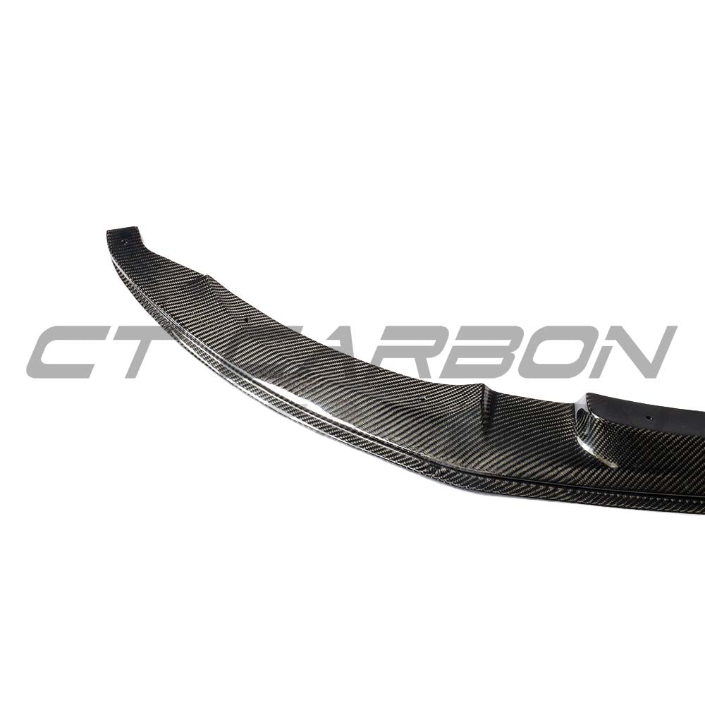 BMW M3/M4 F80/F82/F83 carbon fibre splitter by CT Carbon, featuring a sleek, lightweight design for enhanced aerodynamics.