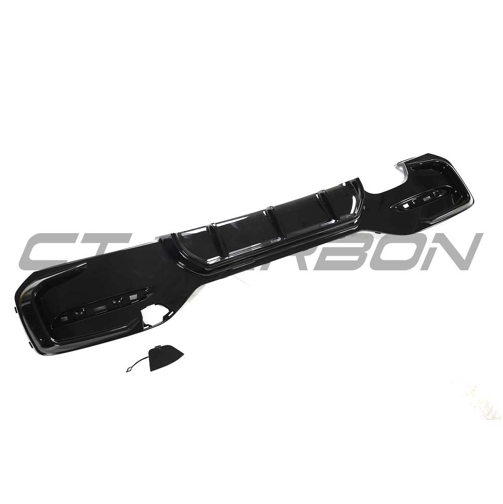 BMW F20/F21 1 Series LCI twin left gloss black kit by CT Carbon, shown as a sleek, high-quality vehicle modification component.