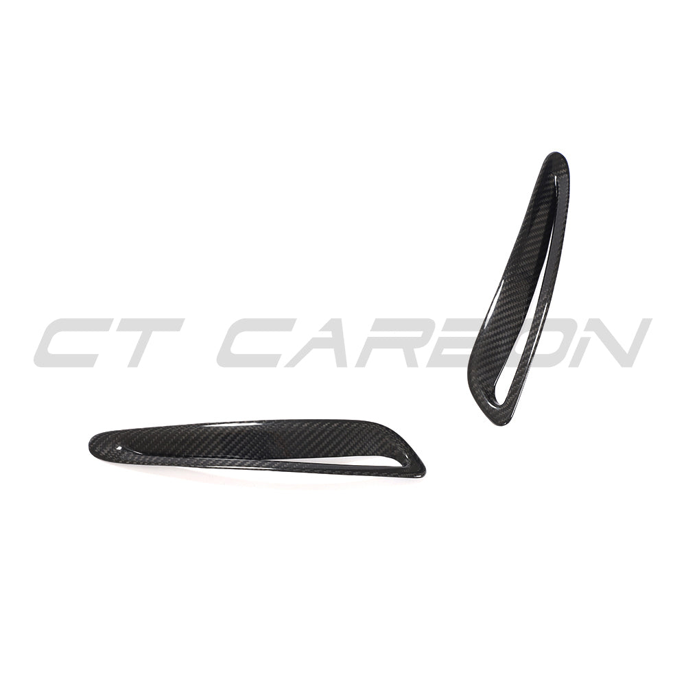 Toyota Supra 2019+ A90 carbon fiber hood/bonnet trim accessory by CT Carbon, close-up view of the lightweight, textured carbon fiber material.