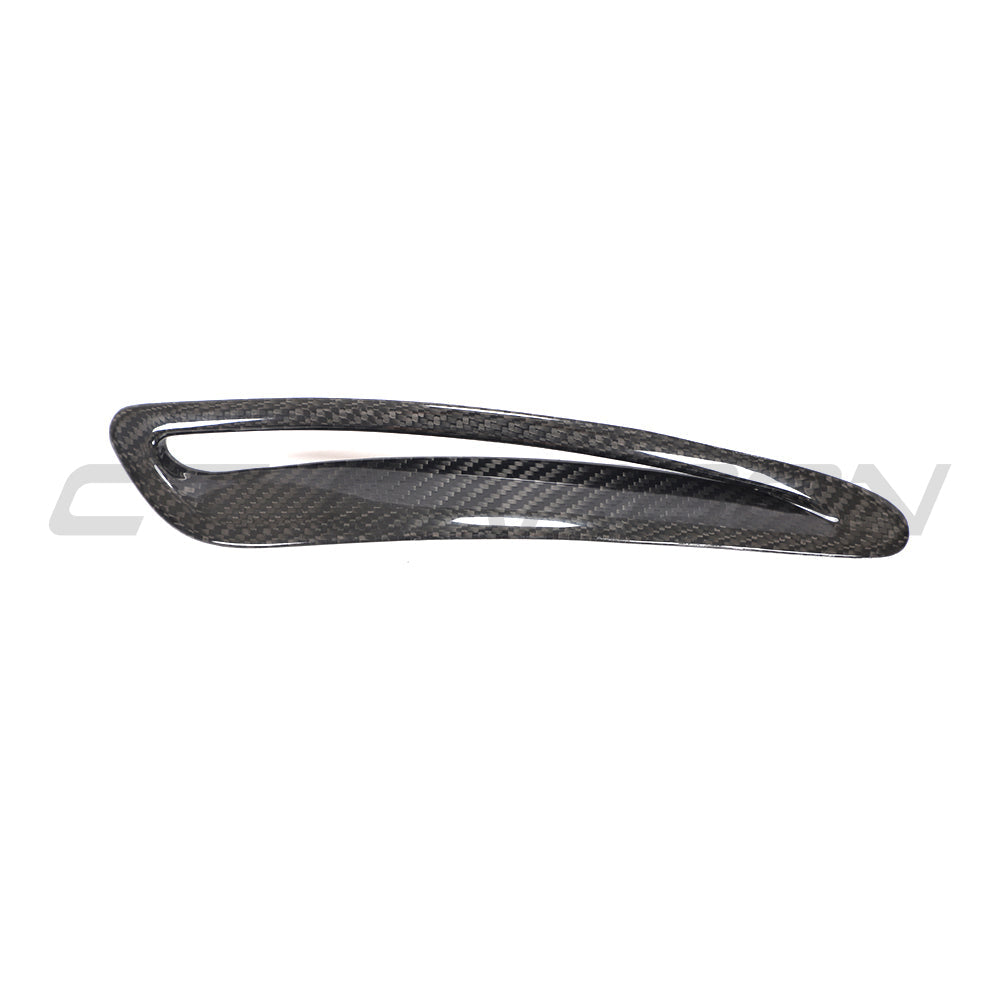 Toyota Supra 2019+ A90 carbon fiber hood trim by CT Carbon, close-up of sleek black carbon fiber accessory.