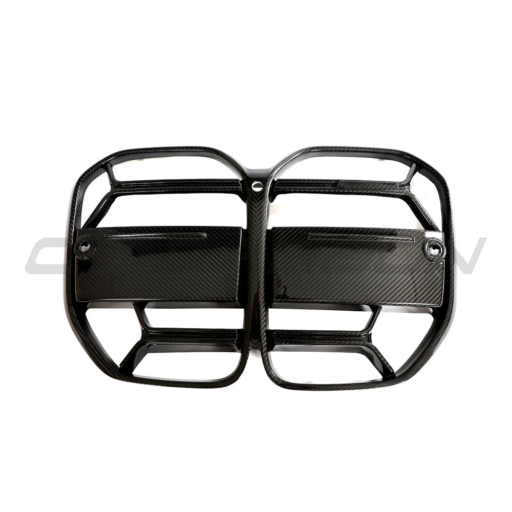BMW 4 Series G22/G23 carbon fibre CSL grille by CT Carbon without ACC, showcasing sleek black textured surface and sporty design.