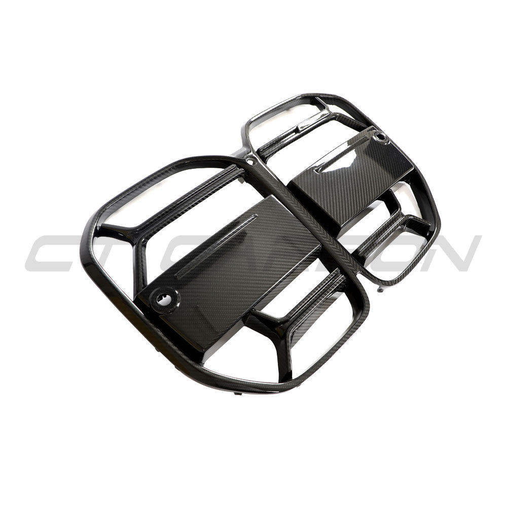 BMW 4 Series G22 G23 carbon fiber CSL grille by CT Carbon, front view showing textured black finish and sleek design.
