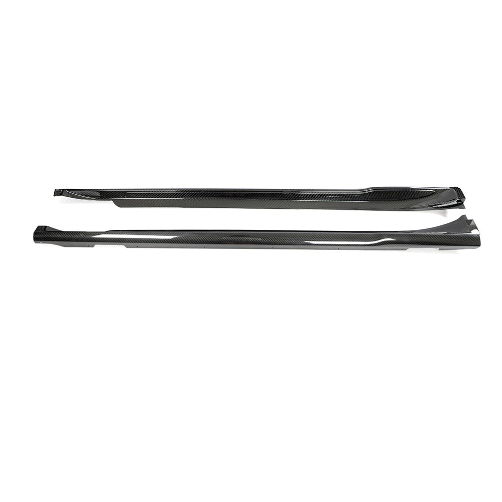 Porsche Taycan 2020-2024 CT Carbon carbon fibre side skirts installed on the vehicle, showcasing sleek aerodynamic design.