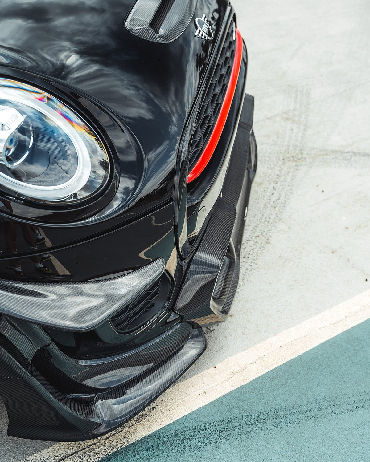 Mini Cooper S F56 JCW Sport Pack carbon fiber wide arch kit by CT Carbon, showing the sleek carbon fiber fender arches on the car.