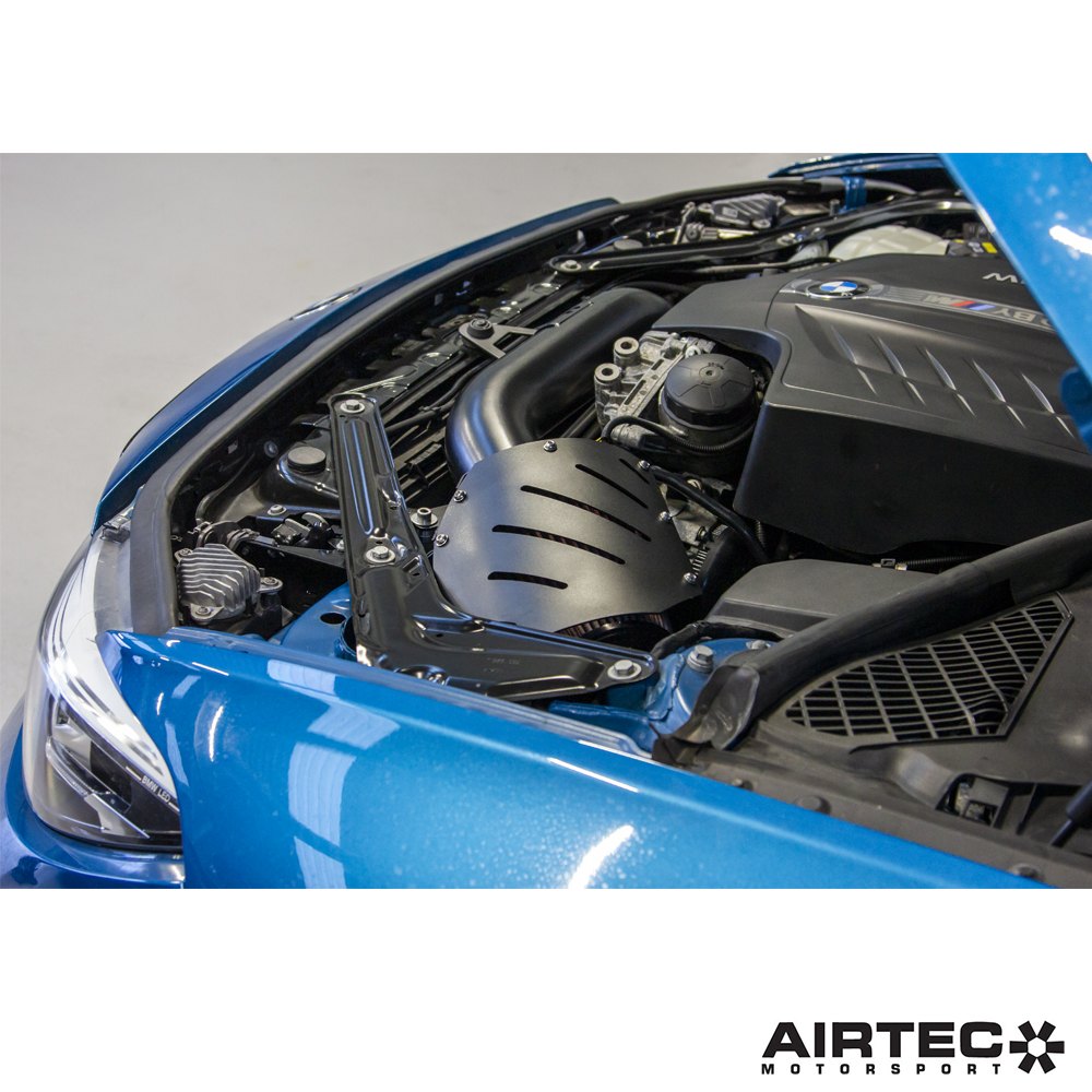 Airtec Motorsport induction kit installed in a BMW N55 engine bay, showcasing the high-performance air intake system.