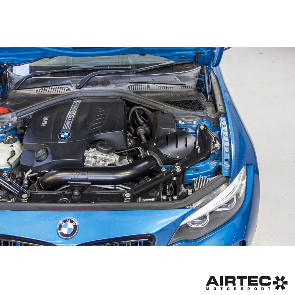 Airtec Motorsport induction kit for BMW N55 engine, showing high-performance air intake components and hoses.