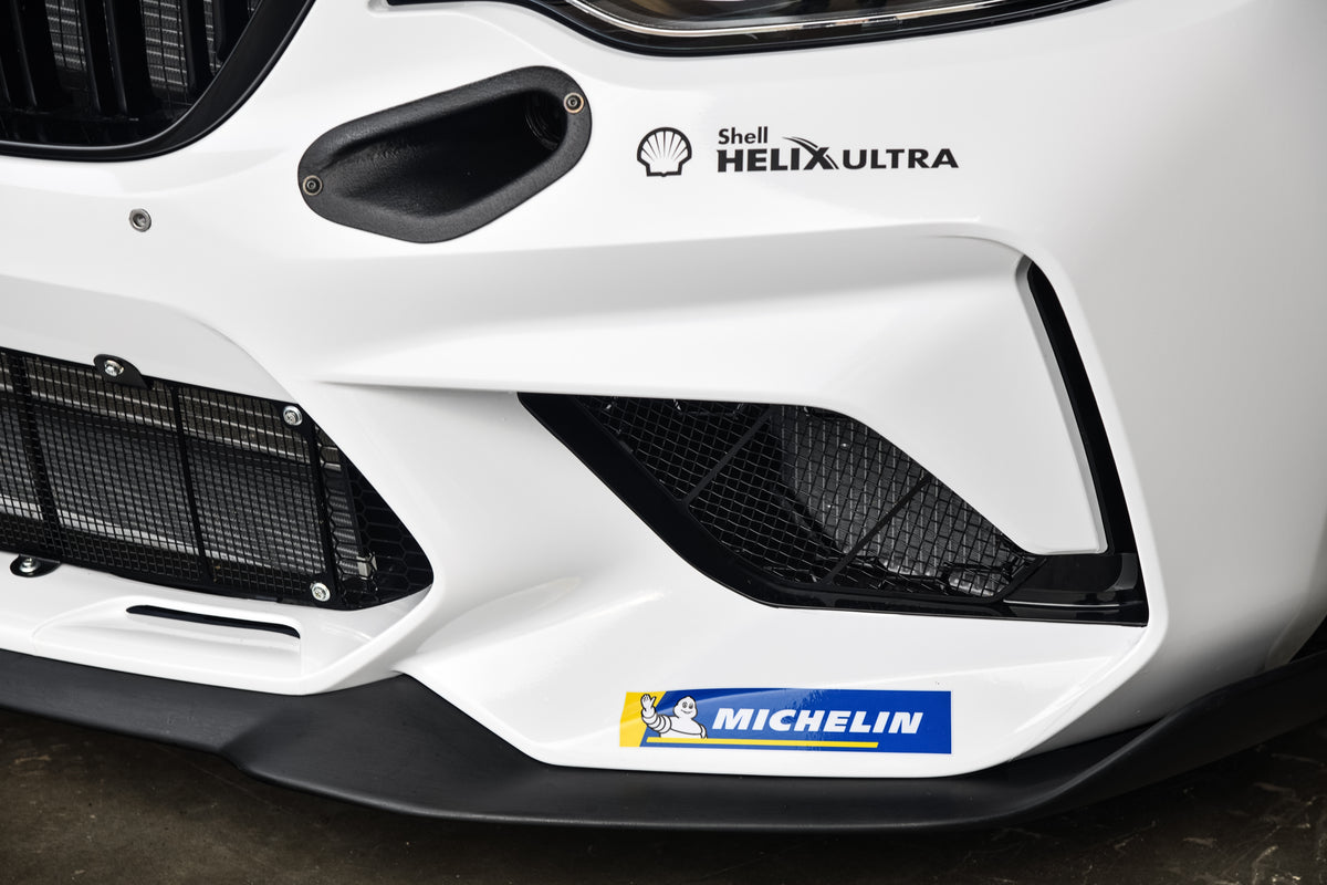 Genuine BMW Motorsport M2 CS Racing front grill kit with sporty design and black finish, fitting BMW M2 CS model.
