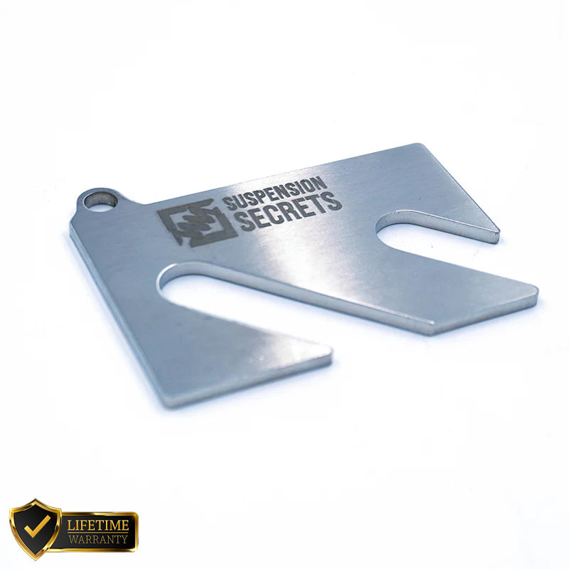 Suspension Secrets front and rear camber shim kit for Porsche 718 GT4 RS, featuring adjustable suspension linkages.