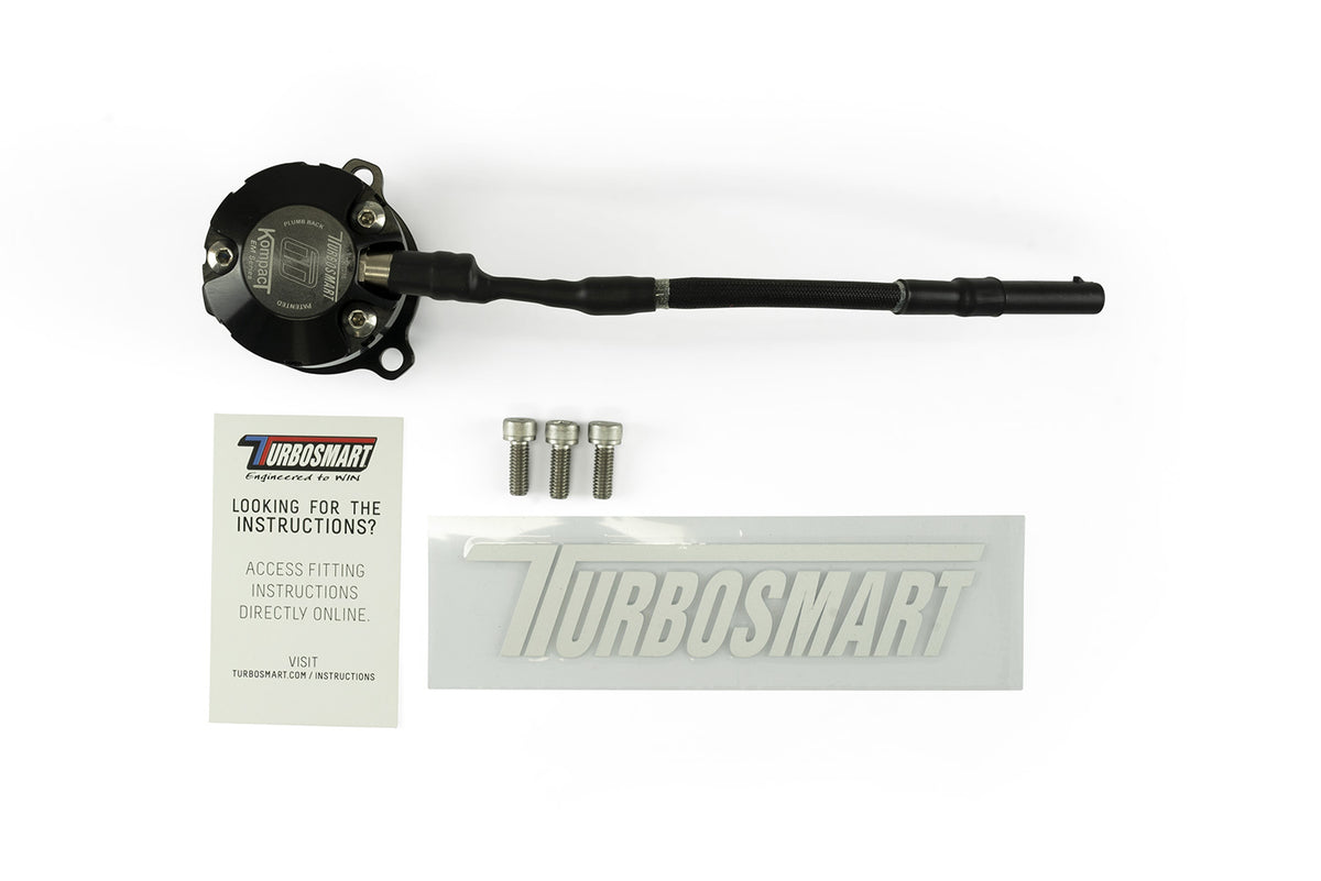 Turbosmart Kompact EM plumb back diverter valve for BMW M2 F87, shown with installation accessories and fittings.
