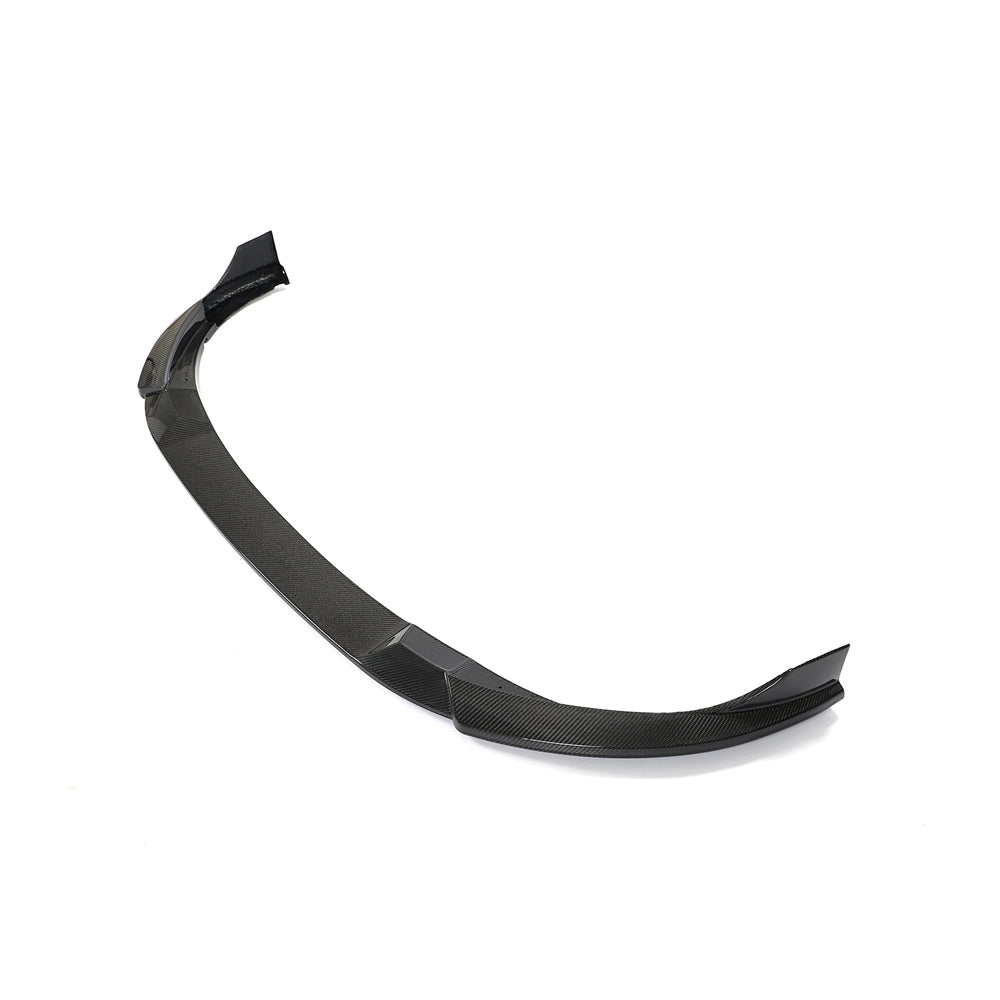 VW Golf MK8 GTI carbon fiber front splitter by CT Carbon, showcasing sleek aerodynamic design and high-quality construction.