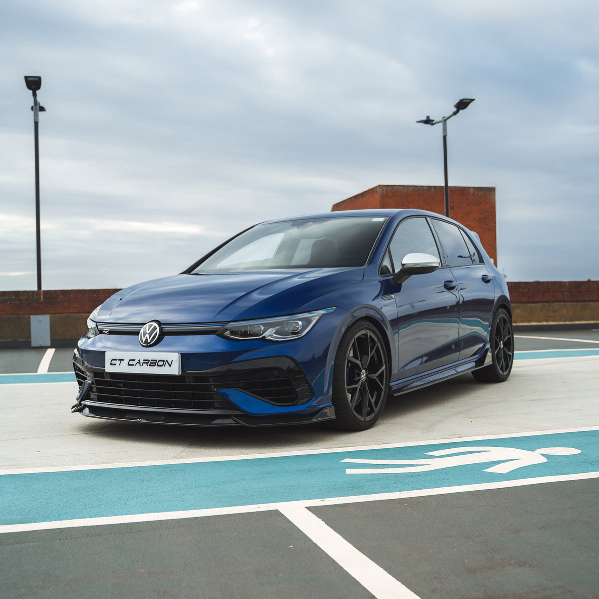 VW Golf MK8 R full carbon fiber kit by CT Design, showing sleek carbon fiber components on the sporty hatchback.