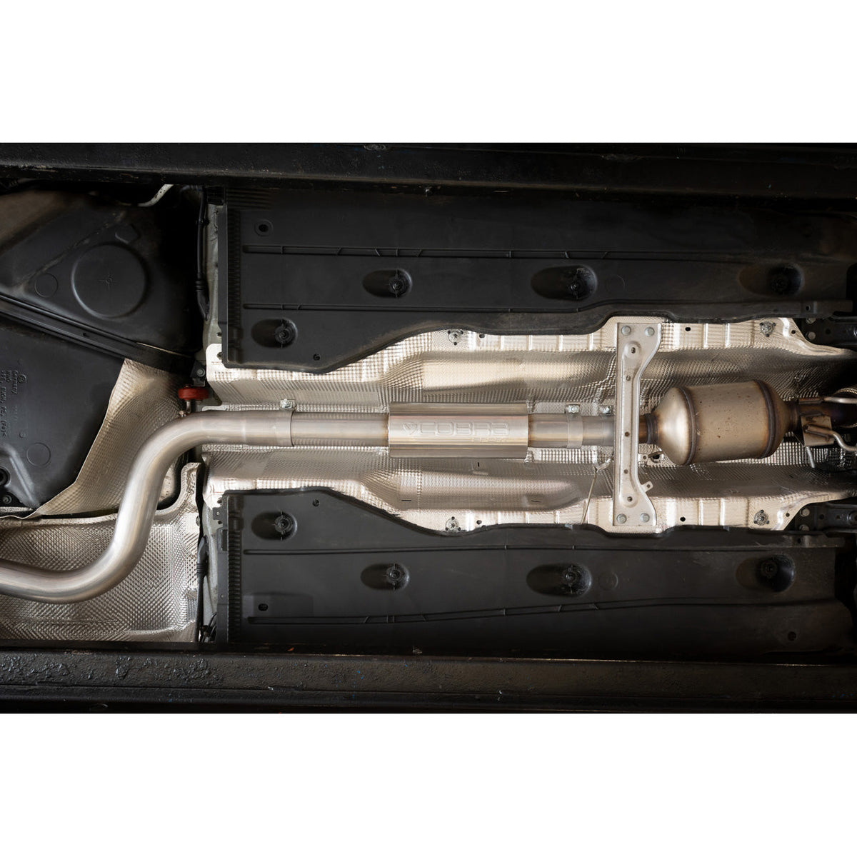 Cobra Sport VW Golf GTI MK7.5 2.0 TSI cat back performance exhaust installed on the car, showcasing the exhaust system and tips.