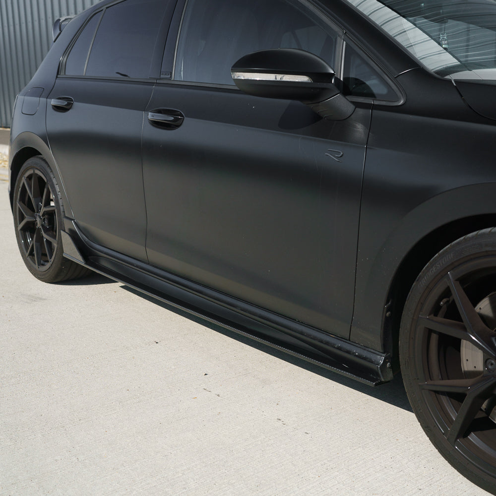 VW Golf MK8/MK8.5 R carbon fibre side skirts by CT Carbon, satin black finish, designed for sporty exterior enhancement.