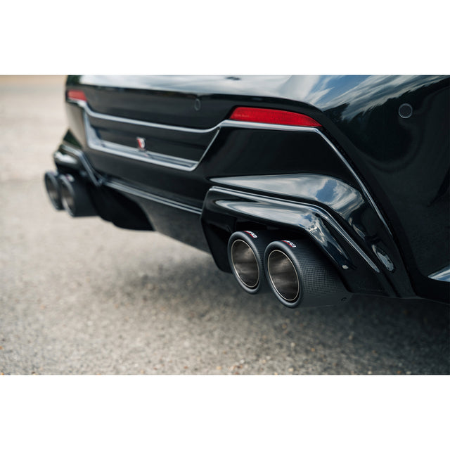 Pair of Cobra Sport 4-inch twin inward rolled carbon fiber exhaust tips for BMW M135i F40 quad exit exhaust system.