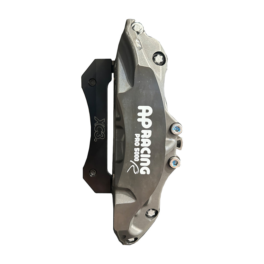 XC3 Engineering BMW M2 M3 M4 caliper carrier and BTCC rotor upgrade for AP Racing CP9660 caliper, shown with brake components.