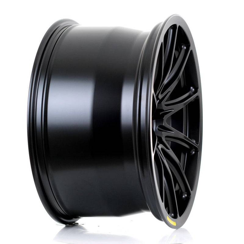 2Forge ZF8-R Fully Forged wheels with sleek, multi-spoke design and matte black finish, shown from a side angle.