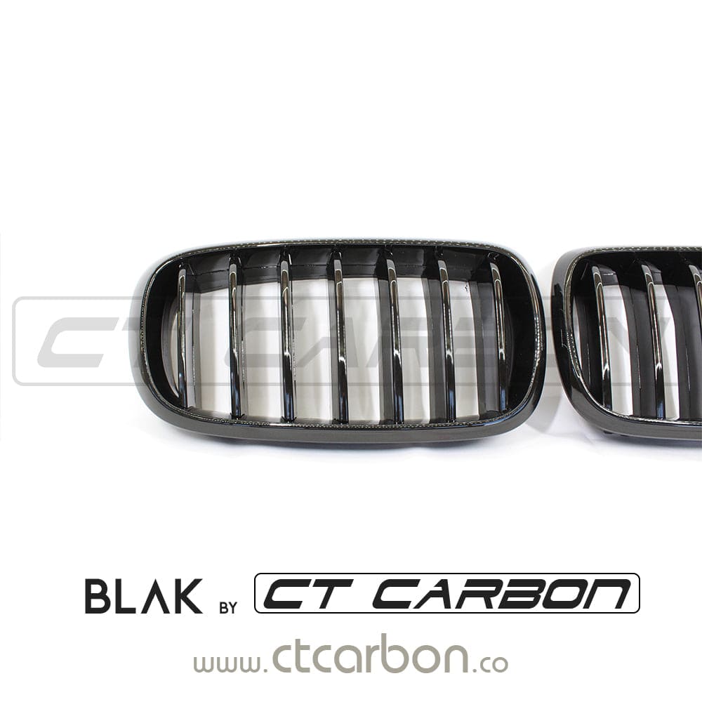 Black single slat grille for BMW F15 F16 X5 X6 by CT Carbon, showcasing sleek black design on a BMW model.