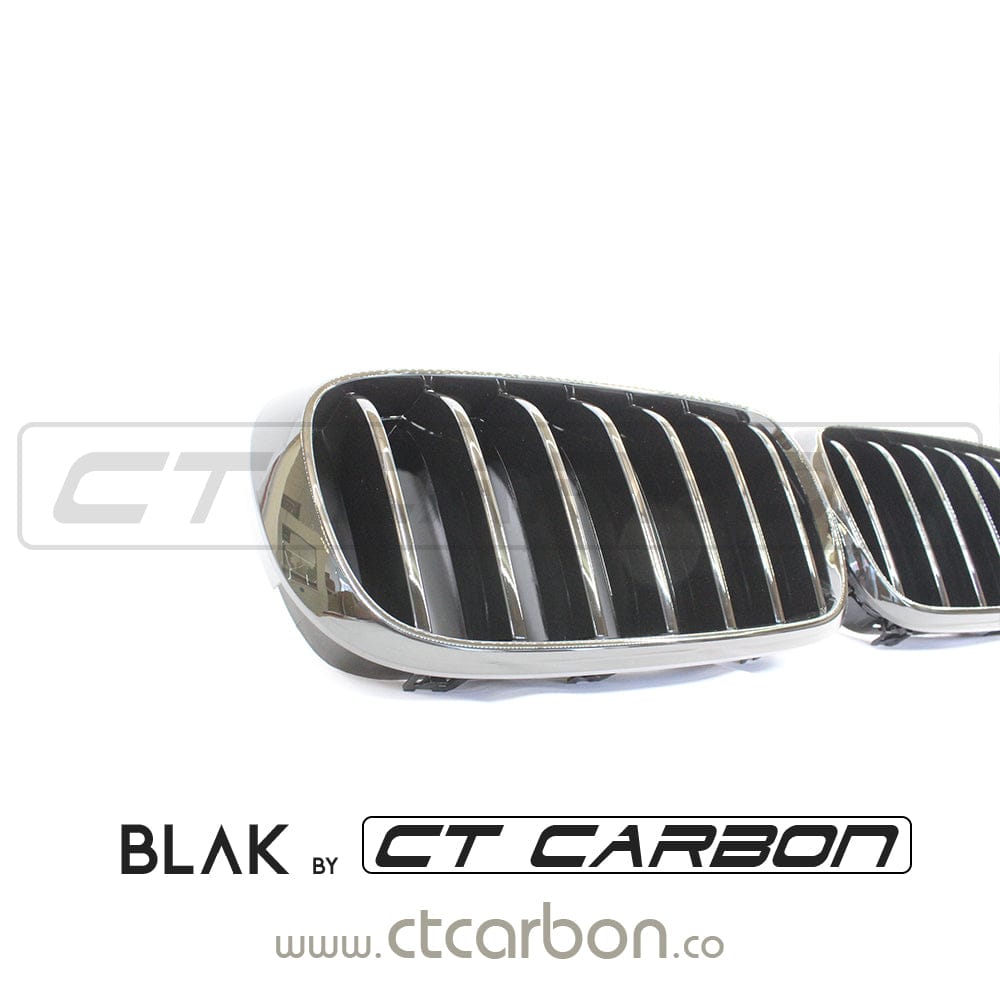Black single slat grille for BMW F15 F16 X5 X6 by CT Carbon, showcasing sleek black design on the vehicle.